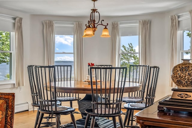 27 Highview Ter, Belfast, ME 04915 - dining space with baseboard heating and light wood finished floors
