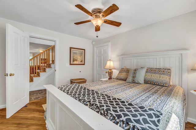 27 Highview Ter, Belfast, ME 04915 - bedroom featuring light wood-type flooring and a ceiling fan