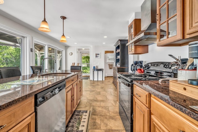 27 Highview Ter, Belfast, ME 04915 - kitchen with black range with electric stovetop, stainless steel dishwasher, wall chimney exhaust hood, pendant lighting, and glass insert cabinets