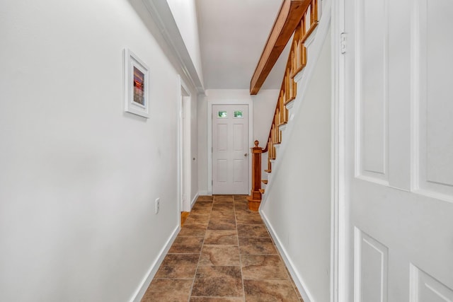 27 Highview Ter, Belfast, ME 04915 - corridor with dark stone finish flooring and stairway