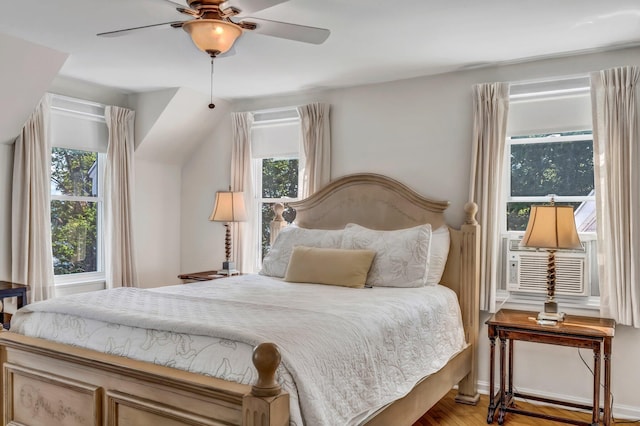 27 Highview Ter, Belfast, ME 04915 - bedroom with wood finished floors, cooling unit, and a ceiling fan