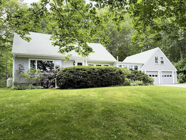 190 Belfast Rd, Camden, ME 04843 - view of green lawn with driveway and an attached garage