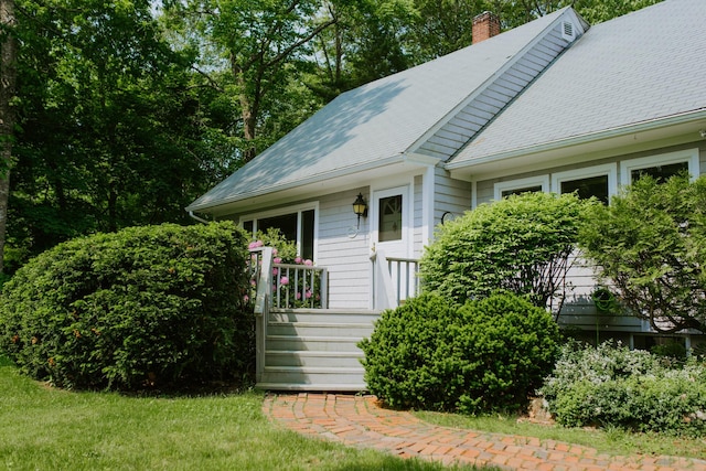 190 Belfast Rd, Camden, ME 04843 - view of front facade featuring a chimney and roof with shingles