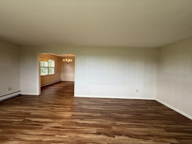 54 Pine Ledge Rd, Bangor, ME 04401 - spare room featuring a chandelier, a baseboard heating unit, wood finished floors, and a baseboard radiator