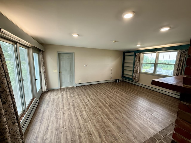 54 Pine Ledge Rd, Bangor, ME 04401 - unfurnished living room featuring a baseboard radiator, wood finished floors, recessed lighting, and a baseboard heating unit