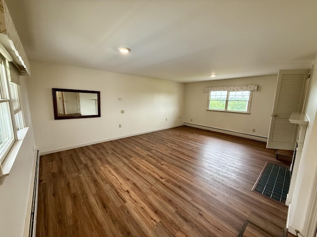 54 Pine Ledge Rd, Bangor, ME 04401 - unfurnished living room with baseboard heating, wood finished floors, and recessed lighting