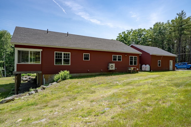 172 Hoxie Hill Rd, Orrington, ME 04474 - back of house with a lawn and a shingled roof