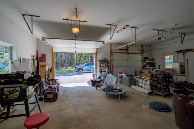 172 Hoxie Hill Rd, Orrington, ME 04474 - garage featuring a garage door opener