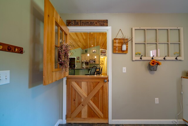 172 Hoxie Hill Rd, Orrington, ME 04474 - hall with vaulted ceiling and baseboards
