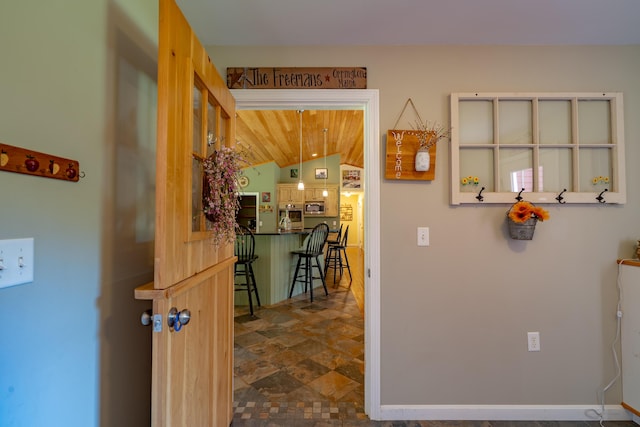 172 Hoxie Hill Rd, Orrington, ME 04474 - hall with stone finish floors and lofted ceiling