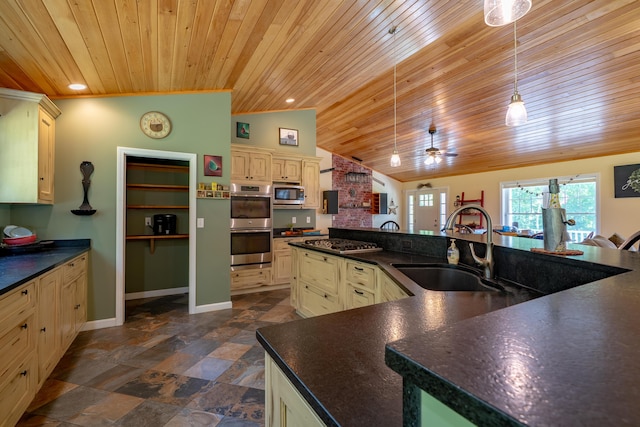 172 Hoxie Hill Rd, Orrington, ME 04474 - kitchen featuring wood ceiling, appliances with stainless steel finishes, cream cabinetry, dark countertops, and vaulted ceiling
