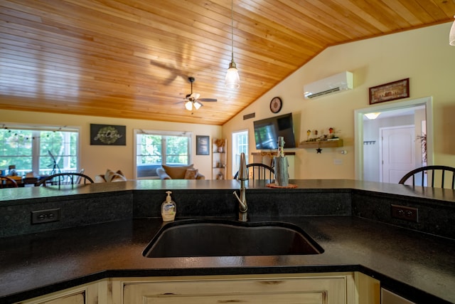 172 Hoxie Hill Rd, Orrington, ME 04474 - kitchen with a wall mounted AC, wood ceiling, vaulted ceiling, a ceiling fan, and dark countertops