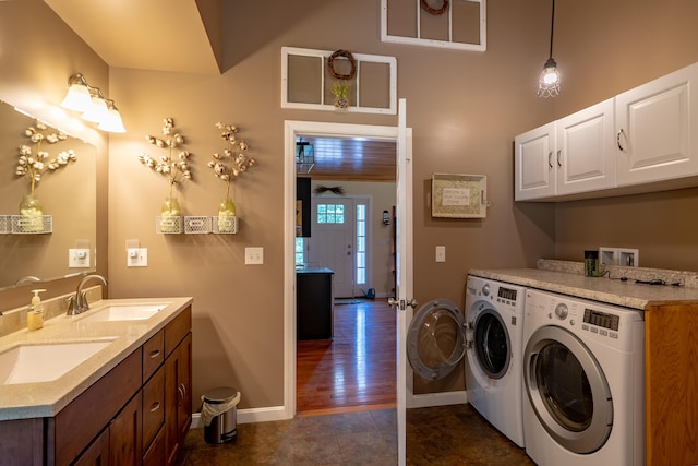 172 Hoxie Hill Rd, Orrington, ME 04474 - laundry room with washing machine and clothes dryer, cabinet space, dark tile patterned flooring, and ceiling fan