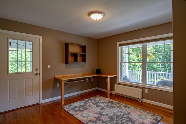 172 Hoxie Hill Rd, Orrington, ME 04474 - office featuring radiator heating unit and wood finished floors