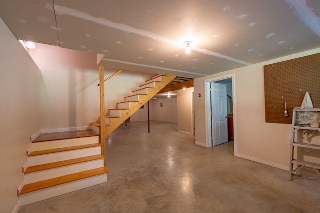 172 Hoxie Hill Rd, Orrington, ME 04474 - below grade area featuring stairway and baseboards