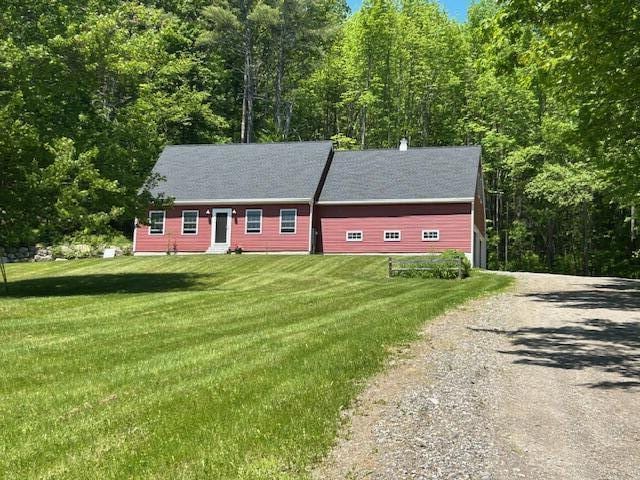 453 Canton Rd, Livermore, ME 04253 - view of front facade with driveway and a front lawn