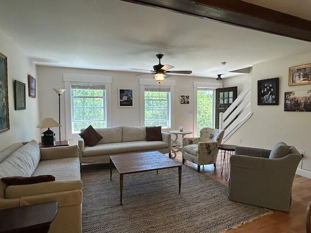 453 Canton Rd, Livermore, ME 04253 - living area with wood finished floors, a ceiling fan, and baseboards