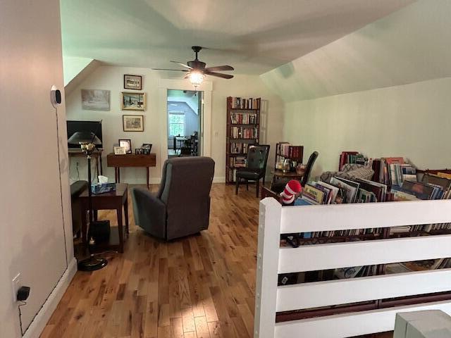 453 Canton Rd, Livermore, ME 04253 - living room featuring wood finished floors, ceiling fan, and baseboards