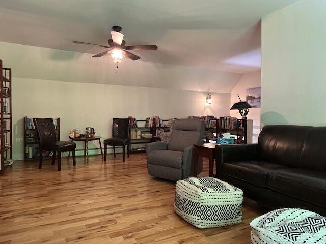 453 Canton Rd, Livermore, ME 04253 - living room with wood finished floors, ceiling fan, and vaulted ceiling