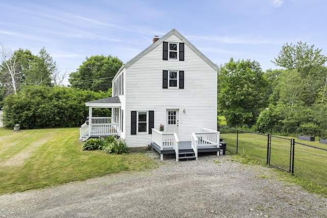 140 New Meadows Rd, West Bath, ME 04530 - view of front facade with a chimney and a deck