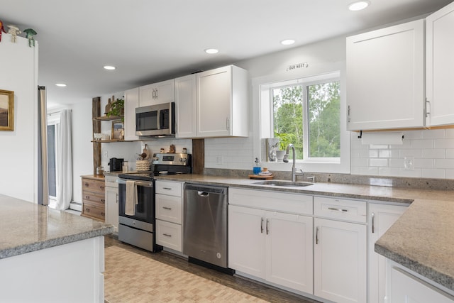 140 New Meadows Rd, West Bath, ME 04530 - kitchen featuring appliances with stainless steel finishes, white cabinets, tasteful backsplash, open shelves, and recessed lighting