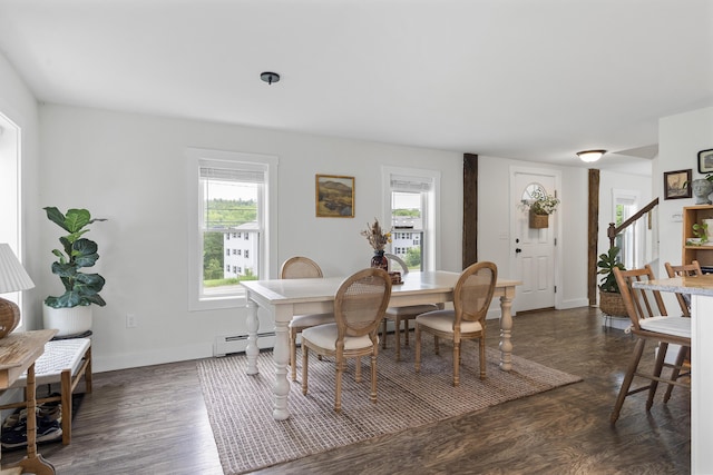 140 New Meadows Rd, West Bath, ME 04530 - dining room featuring healthy amount of natural light, a baseboard heating unit, and dark wood finished floors