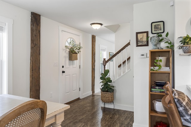 140 New Meadows Rd, West Bath, ME 04530 - entryway with dark wood-style flooring and stairs