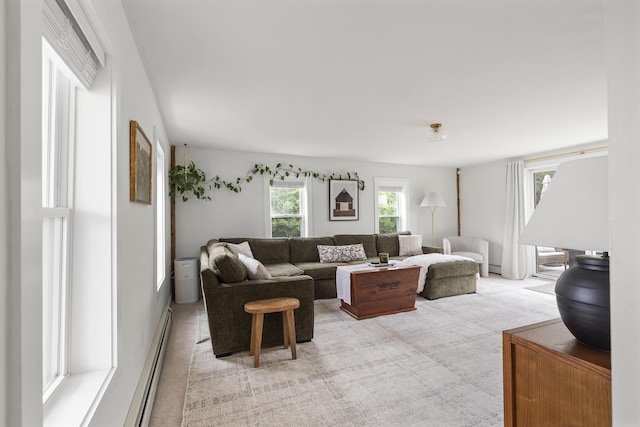140 New Meadows Rd, West Bath, ME 04530 - living area with light colored carpet and a baseboard heating unit