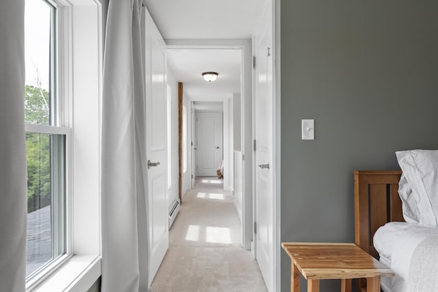 140 New Meadows Rd, West Bath, ME 04530 - corridor featuring light carpet and a baseboard radiator