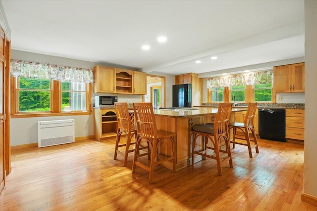 463 Cobbs Bridge Rd, New Gloucester, ME 04260 - kitchen with black appliances, open shelves, light wood-style floors, recessed lighting, and a center island