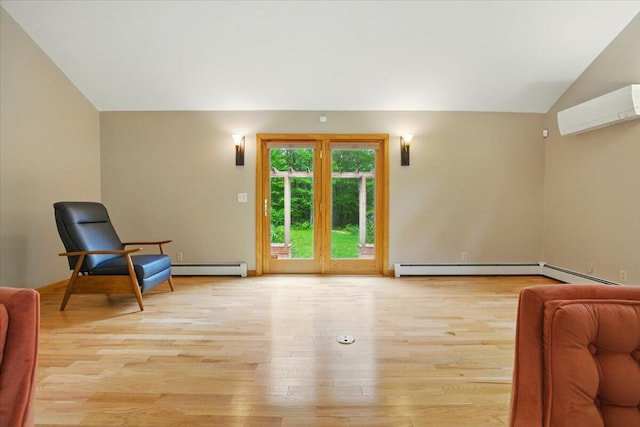 463 Cobbs Bridge Rd, New Gloucester, ME 04260 - living area featuring vaulted ceiling, a wall unit AC, baseboard heating, and light wood-type flooring