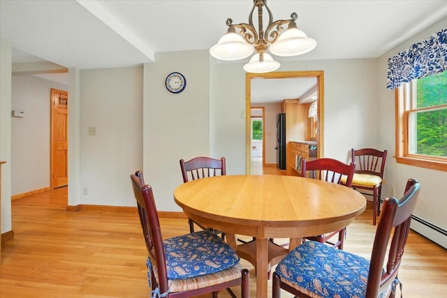 463 Cobbs Bridge Rd, New Gloucester, ME 04260 - dining room with light wood-style flooring and baseboard heating