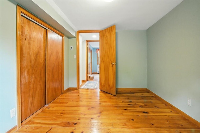 463 Cobbs Bridge Rd, New Gloucester, ME 04260 - unfurnished bedroom featuring light wood finished floors and a closet