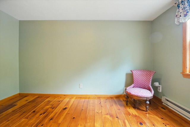 463 Cobbs Bridge Rd, New Gloucester, ME 04260 - unfurnished room with a baseboard heating unit and wood-type flooring