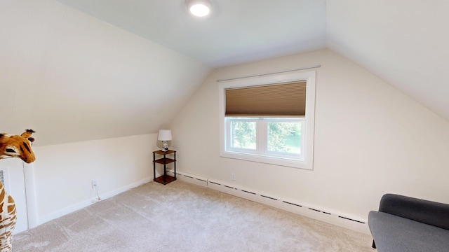 31 Vivian St, Auburn, ME 04210 - additional living space with a baseboard radiator, light carpet, and lofted ceiling
