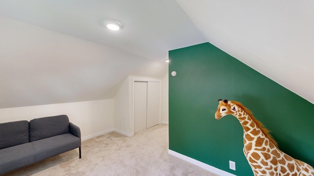31 Vivian St, Auburn, ME 04210 - sitting room featuring lofted ceiling and carpet floors