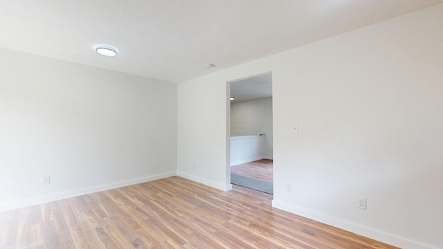 1 Barker St, Jay, ME 04239 - unfurnished room with light wood finished floors and baseboards