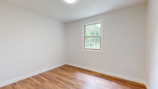 1 Barker St, Jay, ME 04239 - spare room featuring baseboards and light wood-style floors