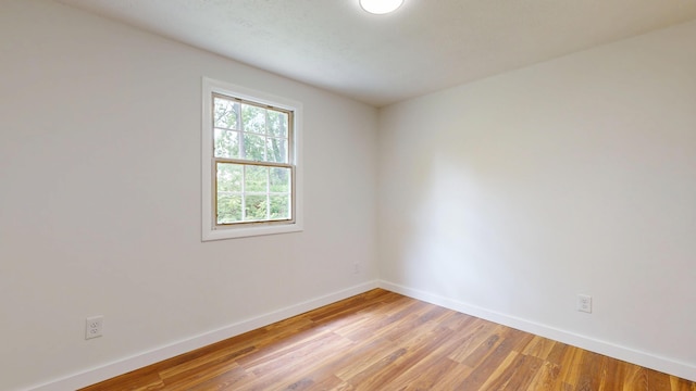 1 Barker St, Jay, ME 04239 - unfurnished room with baseboards and light wood finished floors