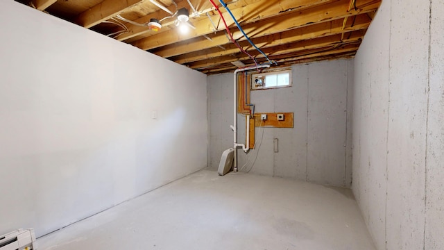 1 Barker St, Jay, ME 04239 - basement featuring a baseboard radiator