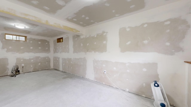 1 Barker St, Jay, ME 04239 - empty room with concrete floors