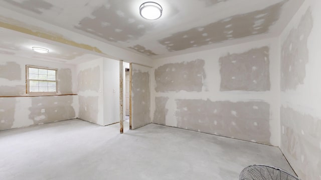 1 Barker St, Jay, ME 04239 - unfurnished room featuring concrete floors
