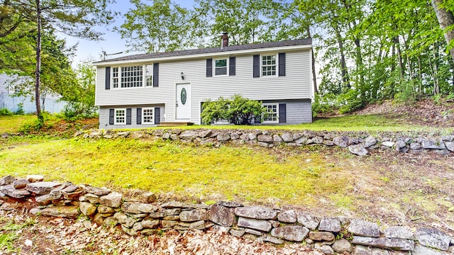 1 Barker St, Jay, ME 04239 - split foyer home with a front lawn