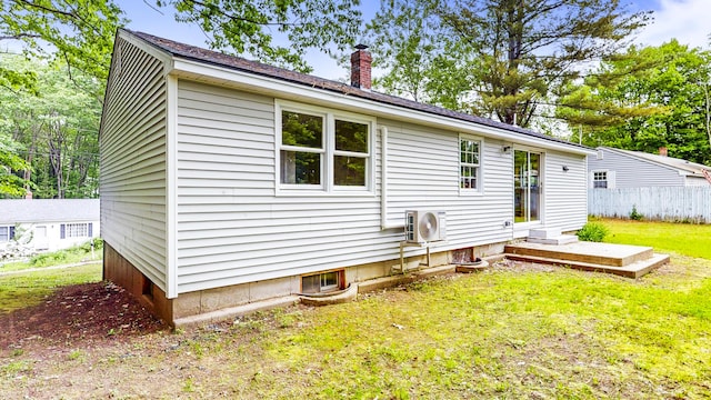 1 Barker St, Jay, ME 04239 - rear view of house with a chimney