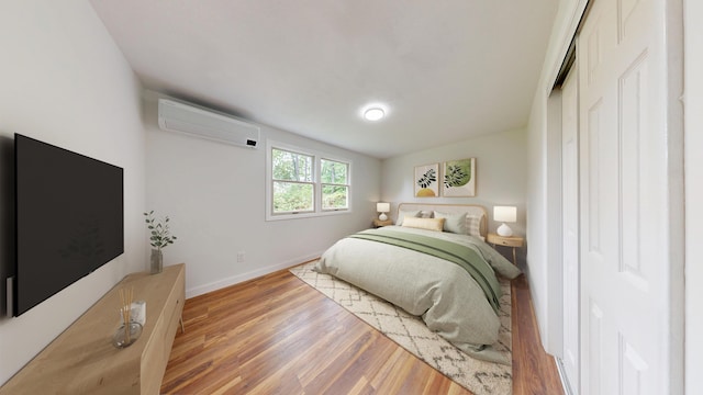 1 Barker St, Jay, ME 04239 - bedroom with an AC wall unit and wood finished floors