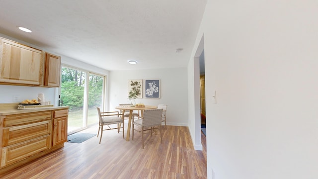 1 Barker St, Jay, ME 04239 - dining space with light wood-style floors and baseboards