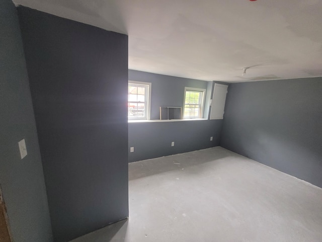 1 Barker St, Jay, ME 04239 - unfurnished room featuring concrete floors