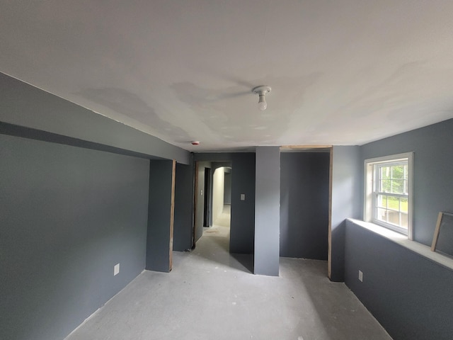 1 Barker St, Jay, ME 04239 - empty room featuring concrete flooring