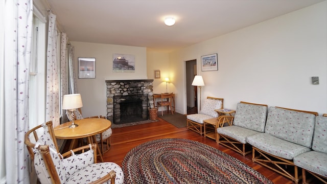 65 Shell Rd, Phippsburg, ME 04562 - living area featuring wood finished floors and a fireplace