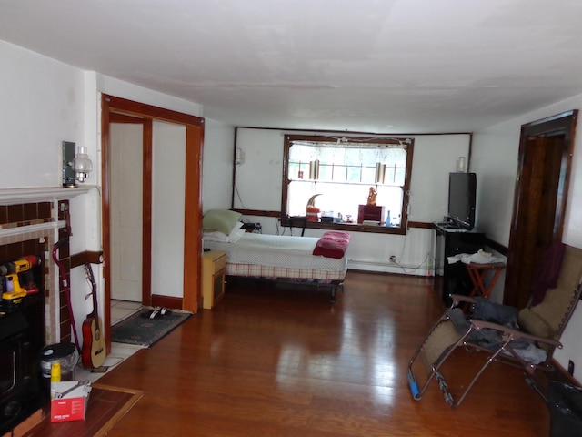 27 Grove St, Sanford, ME 04083 - bedroom with baseboard heating and wood finished floors